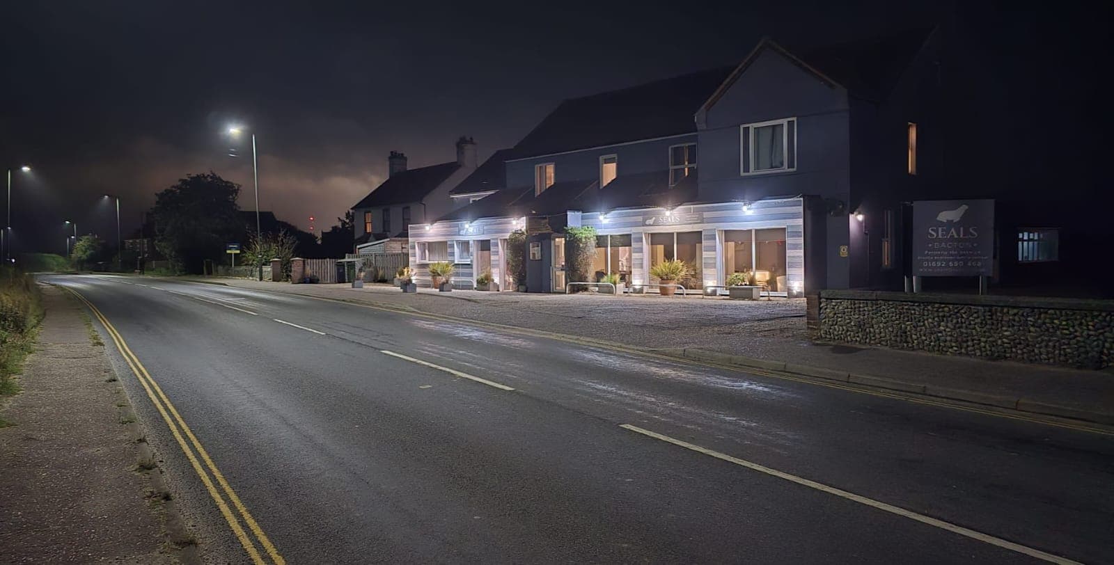 Seals Bacton lit up in the evening